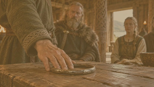 A Norse man touches an oath ring before witnesses in a timber hall, illustrating oath taking in Viking society.